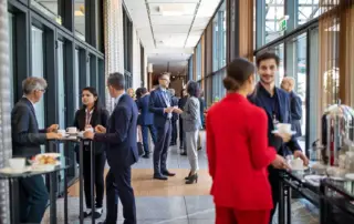 Businesspeople networking at an office building event